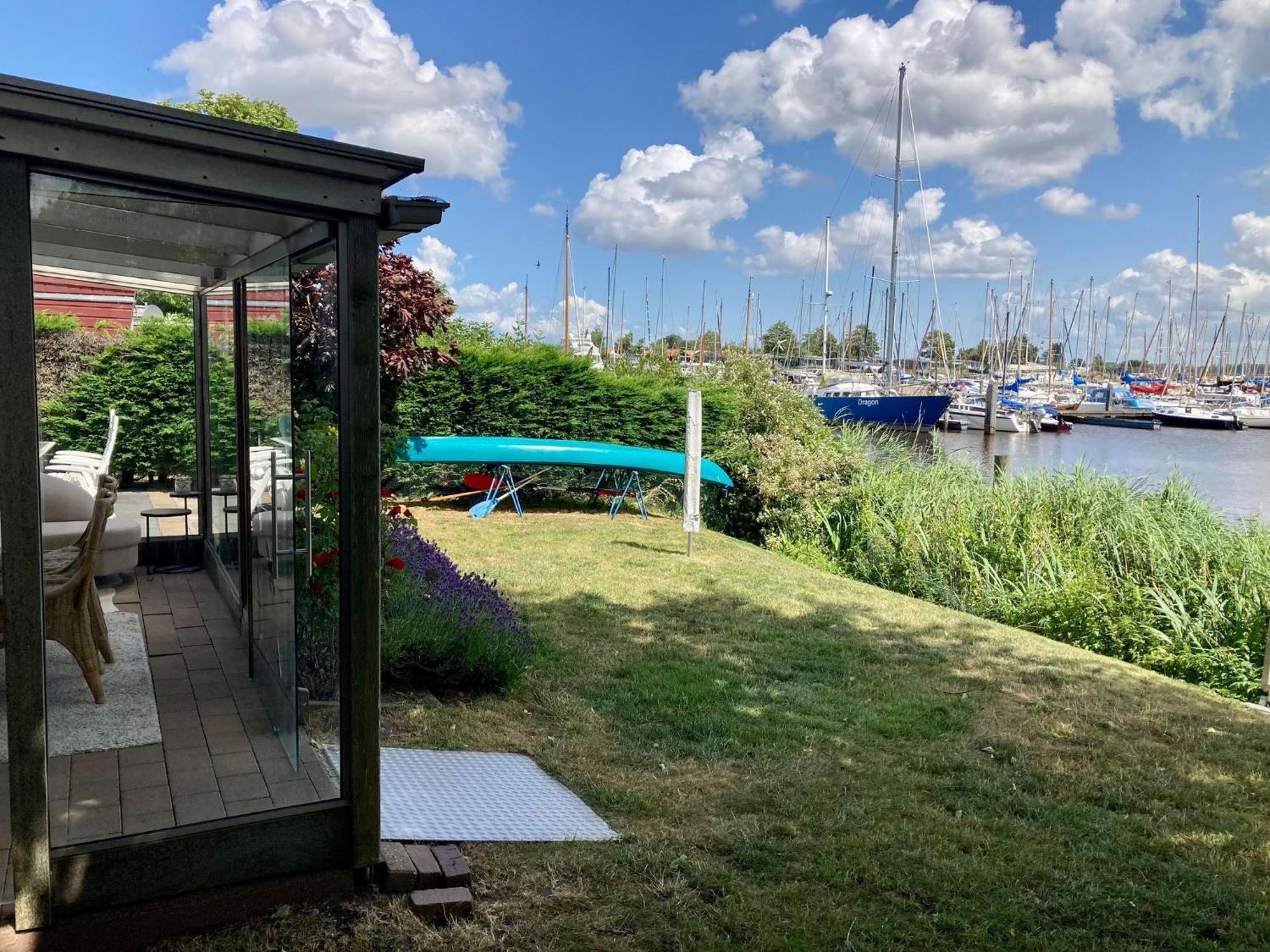 4 Pers Holiday Home Hilla With Winter Garden In Front Of The Dike Directly On The Lauwersmeer أنيوم المظهر الخارجي الصورة